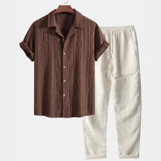 A person wearing a slim-fit camouflage print linen shirt and matching trousers casual suit.