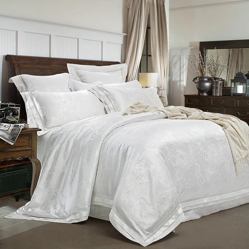 European-style 4-piece pure cotton sateen jacquard bedding set with quilt cover, fitted sheet and two pillowcases shown on a bed