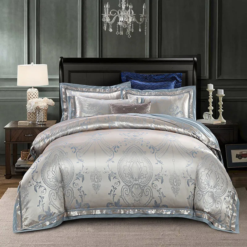 European-style 4-piece pure cotton sateen jacquard bedding set with quilt cover, fitted sheet and two pillowcases shown on a bed