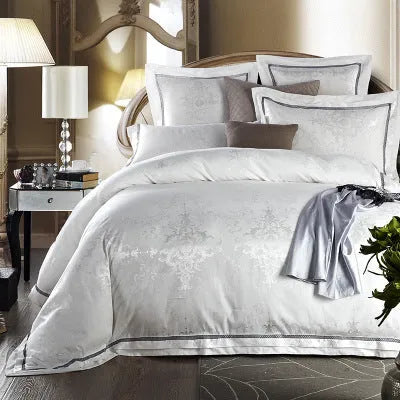 European-style 4-piece pure cotton sateen jacquard bedding set with quilt cover, fitted sheet and two pillowcases shown on a bed