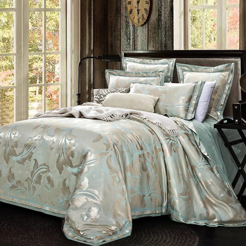 European-style 4-piece pure cotton sateen jacquard bedding set with quilt cover, fitted sheet and two pillowcases shown on a bed