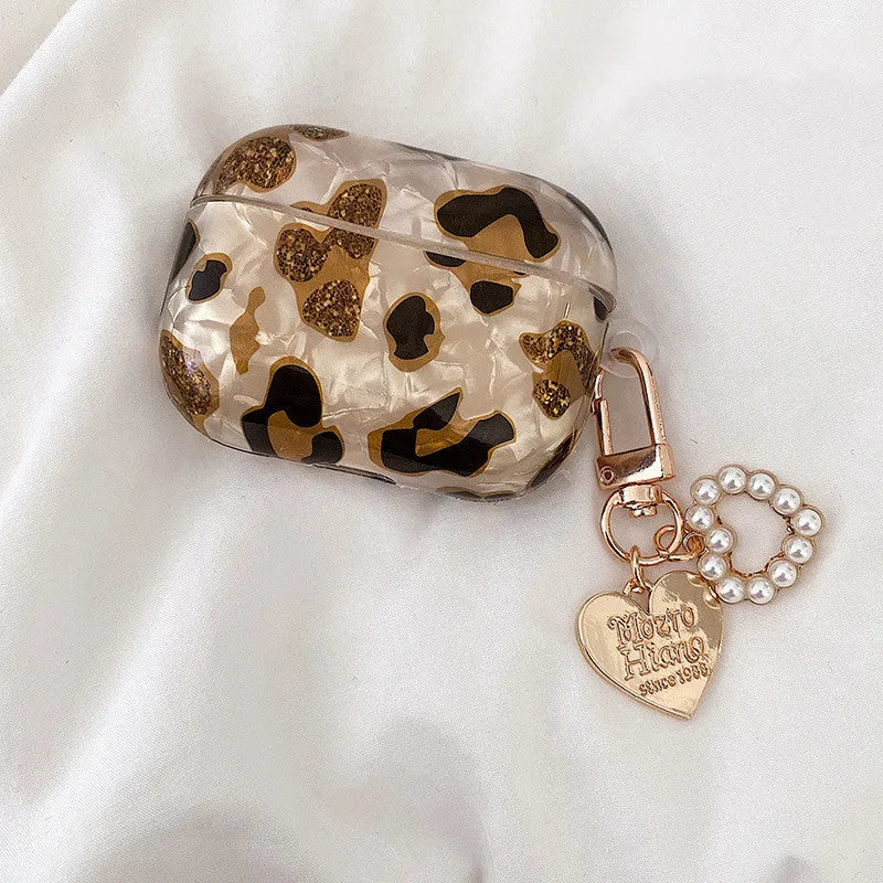 Shell yellow leopard print TPU case for AirPods Pro showing flip design and decorative ornaments