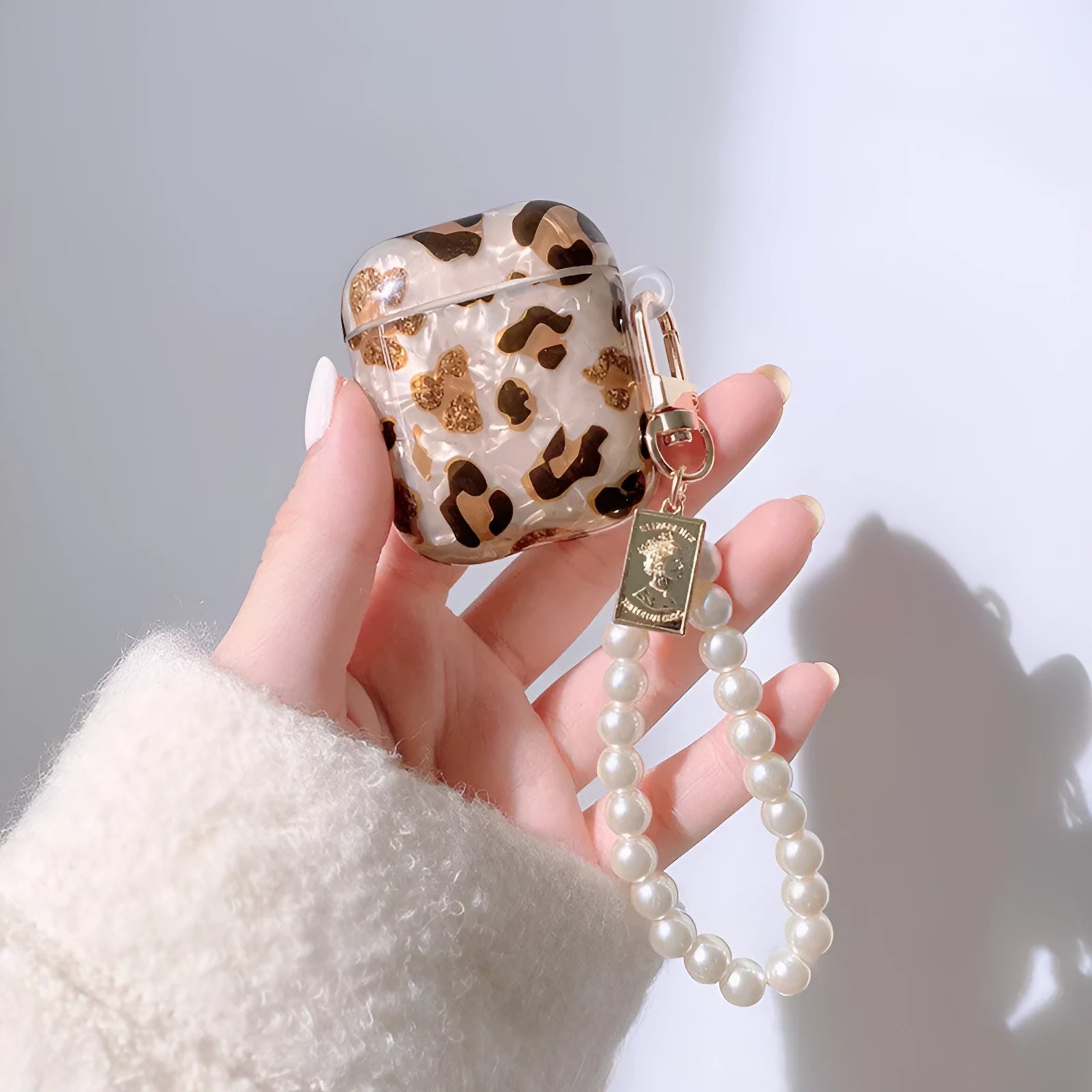 Shell yellow leopard print TPU case for AirPods Pro showing flip design and decorative ornaments