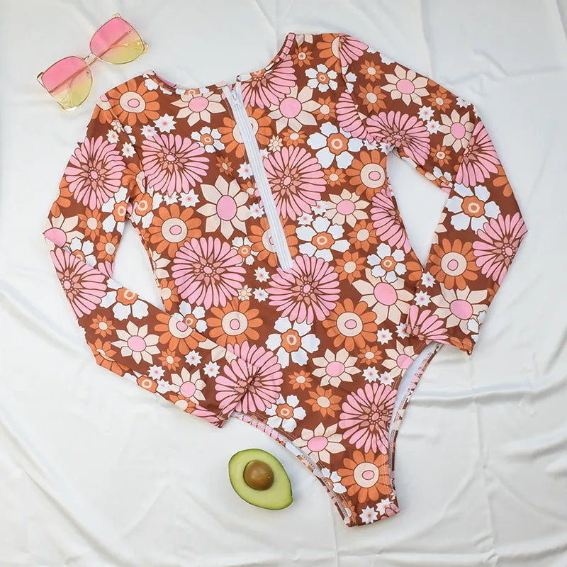 Long sleeve floral polyester swimsuit with chest pad for women, available in S M L XL