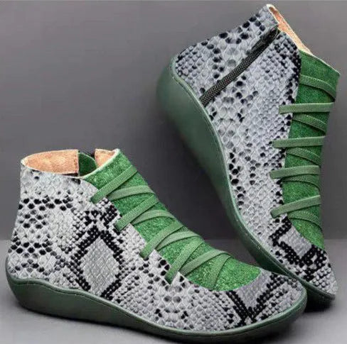 Women's casual ankle booties with a round toe, wedge heel, PU upper, and rubber sole in a selection of colours.