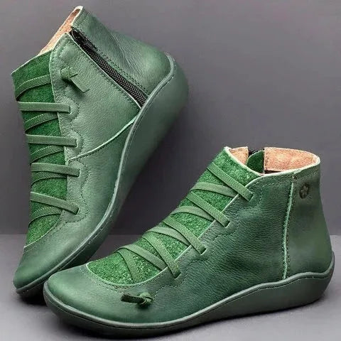 Women's casual ankle booties with a round toe, wedge heel, PU upper, and rubber sole in a selection of colours.