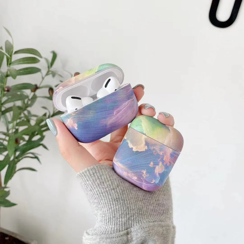 Hard shell protective case for AirPods Pro and AirPods 1/2 in watercolour pink or blue design.