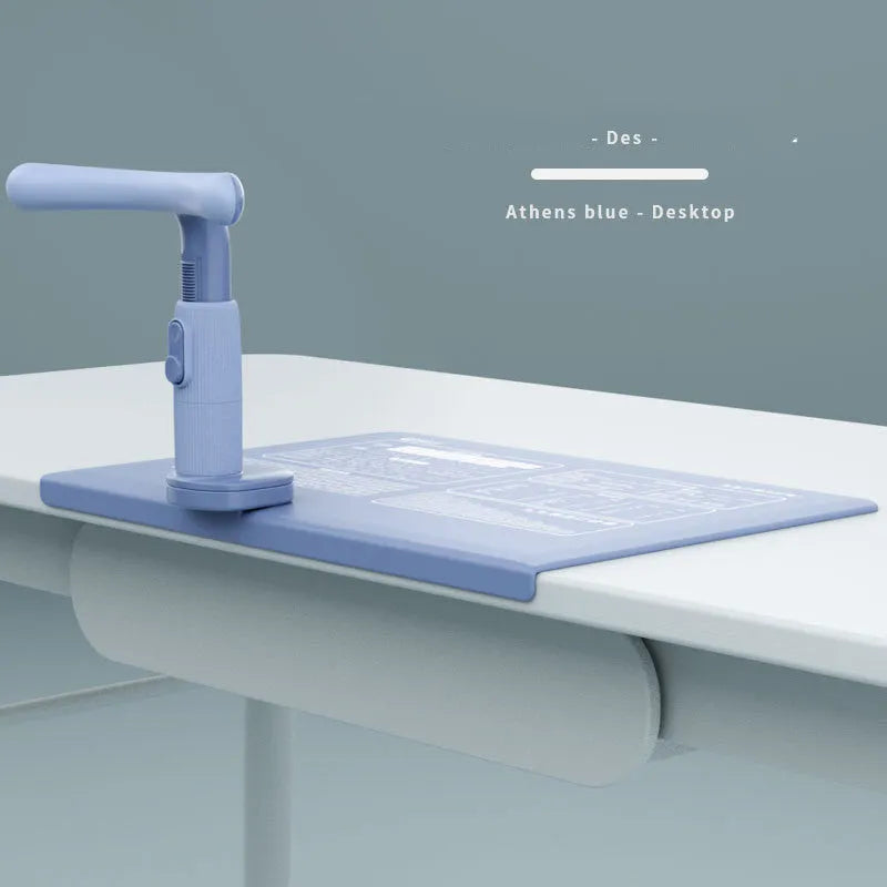 Children's sitting posture corrector with adjustable ABS frame in Athens blue on a desk