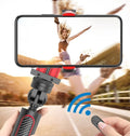 Black red aluminium video balance stabilizer tripod extended to 716mm holding an iPhone smartphone