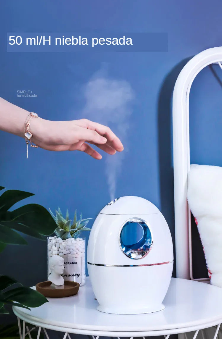 Small round white USB humidifier and aromatherapy diffuser with water tank