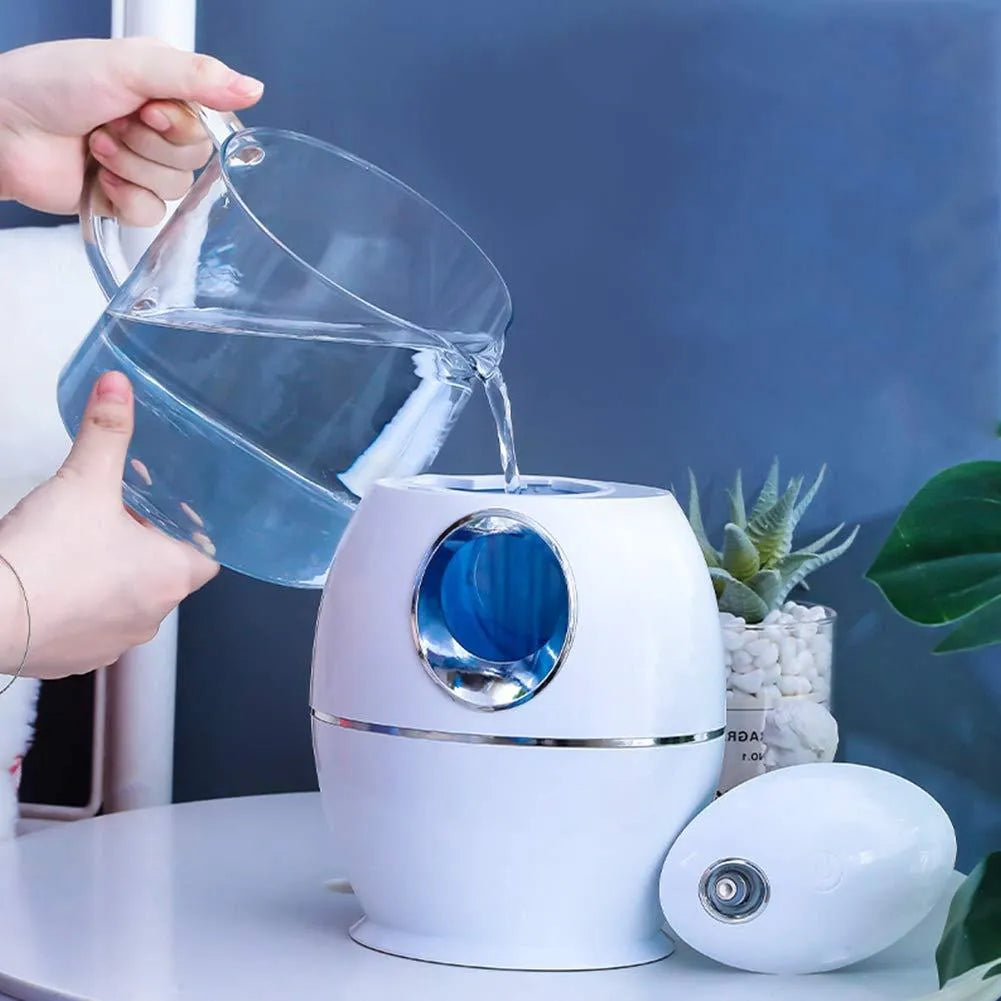 Small round white USB humidifier and aromatherapy diffuser with water tank
