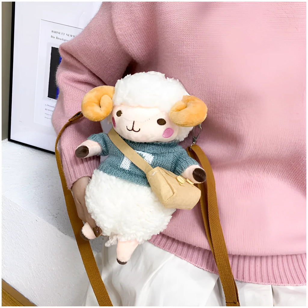 Little Sheep plush crossbody bag in blue with square shape, zip opening and lamb pattern