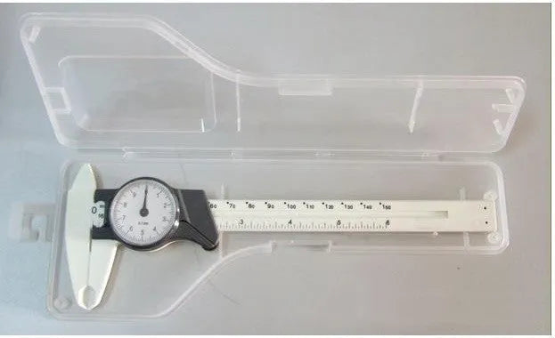 Black and white plastic vernier caliper with 0-150mm stainless steel scale showing 0.1mm precision markings