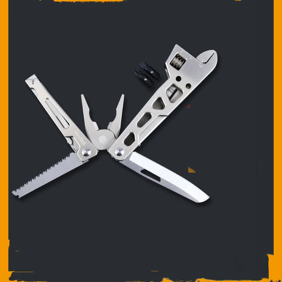 White stainless steel multi-tool with wrench, knife blade, and needle-nose pliers on a plain background.