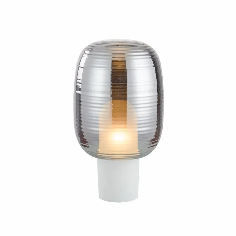 Modern glass table lamp in cognac colour with Nordic design and push button.