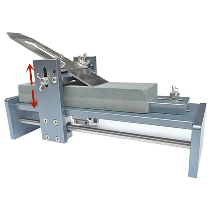 Fixed angle woodworking sharpener for chisels, planers and carving knives on a workbench.