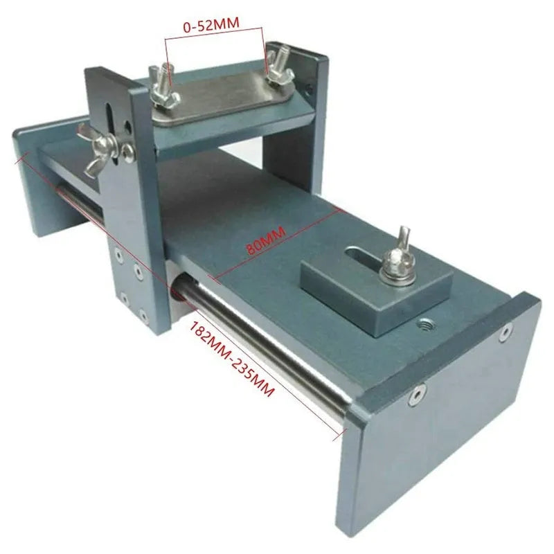 Fixed angle woodworking sharpener for chisels, planers and carving knives on a workbench.
