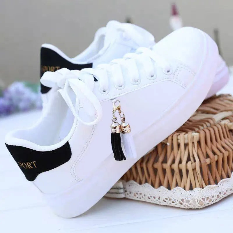 White mesh sneakers with PU upper and rubber sole in sizes 35-40 with black or pink options