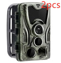 Green cellular trail camera with belt mount for hunting and wildlife monitoring