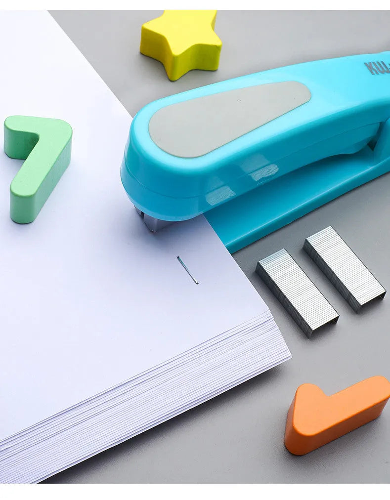 360-degree rotatable stapler in dark blue on a desk with papers, showing swivel head movement.