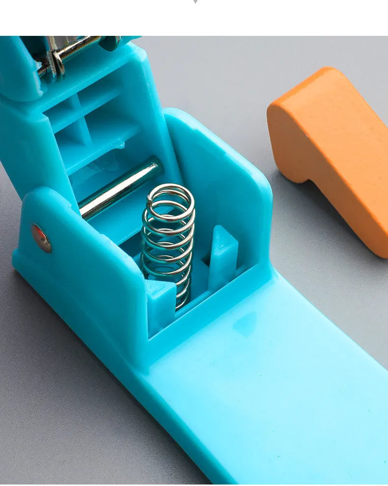 360-degree rotatable stapler in dark blue on a desk with papers, showing swivel head movement.