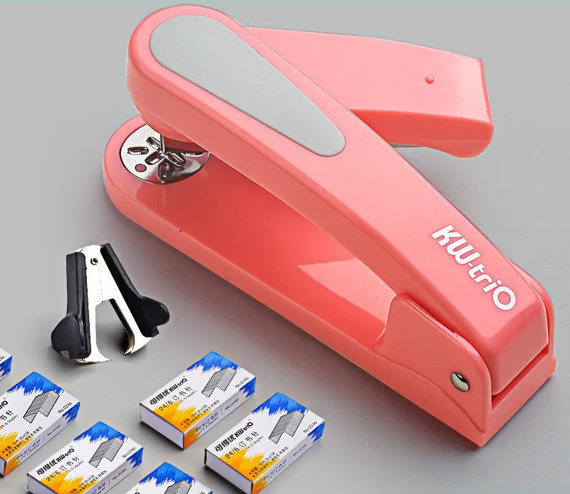360-degree rotatable stapler in dark blue on a desk with papers, showing swivel head movement.