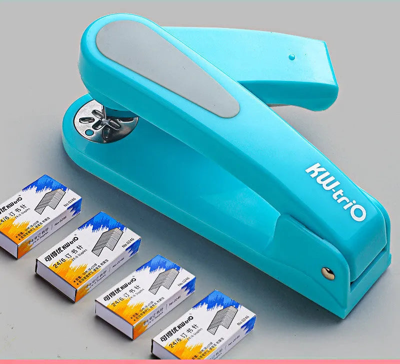360-degree rotatable stapler in dark blue on a desk with papers, showing swivel head movement.