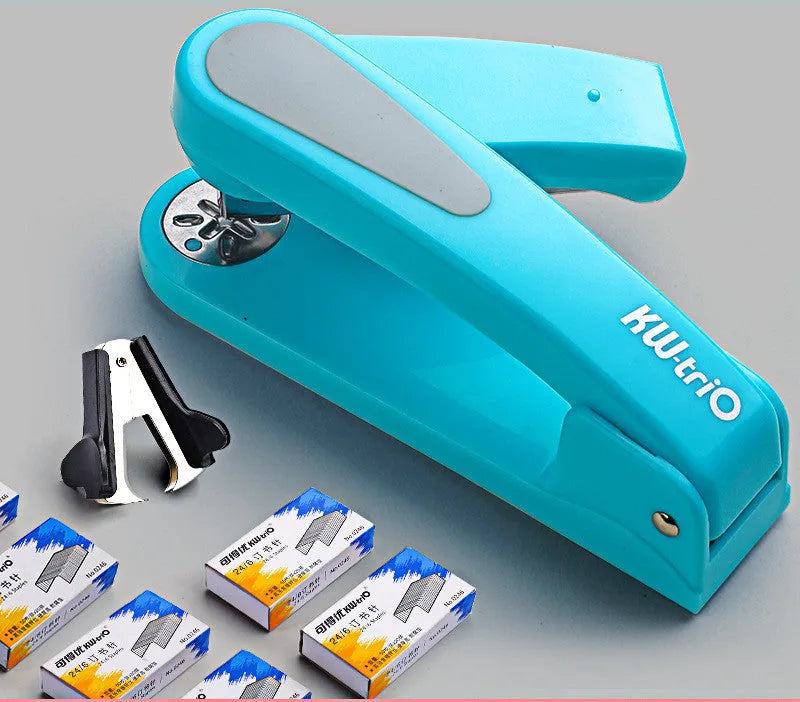 360-degree rotatable stapler in dark blue on a desk with papers, showing swivel head movement.