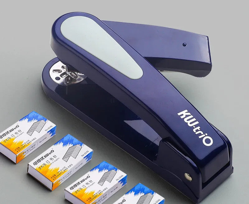 360-degree rotatable stapler in dark blue on a desk with papers, showing swivel head movement.