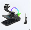 Silver and black 360-degree rotating backpack clip mount for GoPro and action cameras on a backpack strap.