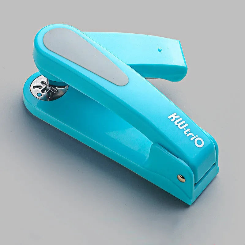 360-degree rotatable stapler in dark blue on a desk with papers, showing swivel head movement.