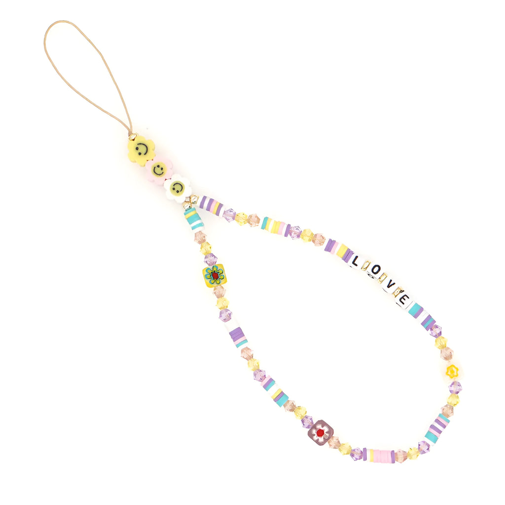 Handmade bohemian smiley soft ceramic beaded phone chain with crystal and acrylic letter beads on a light background