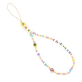 Handmade bohemian smiley soft ceramic beaded phone chain with crystal and acrylic letter beads on a light background