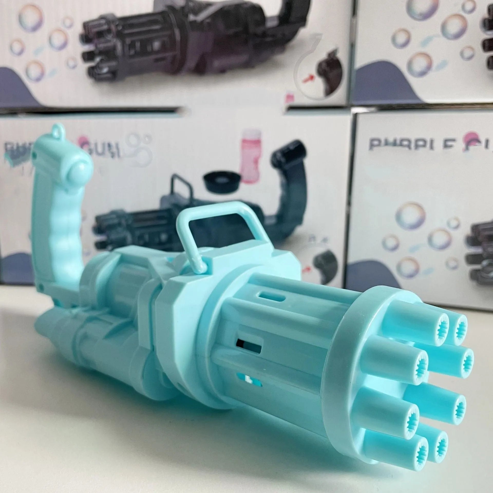 Realistic pink bubble machine gun toy for kids on a green lawn.