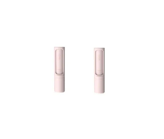 Rotating cylinder electrostatic pet hair removal brush in light pink with ABS body on a white background
