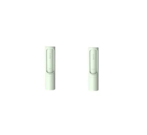 Rotating cylinder electrostatic pet hair removal brush in light pink with ABS body on a white background