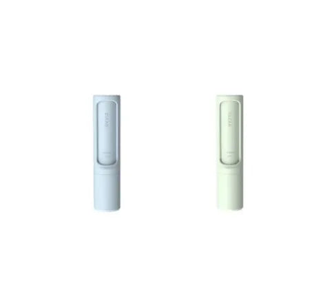 Rotating cylinder electrostatic pet hair removal brush in light pink with ABS body on a white background