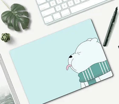 Cartoon character mouse pad on a desk, showing a colourful printed design with an anti-slip rubber base.