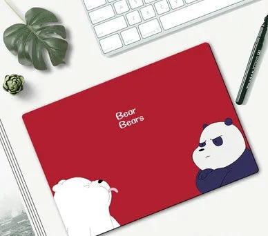 Cartoon character mouse pad on a desk, showing a colourful printed design with an anti-slip rubber base.