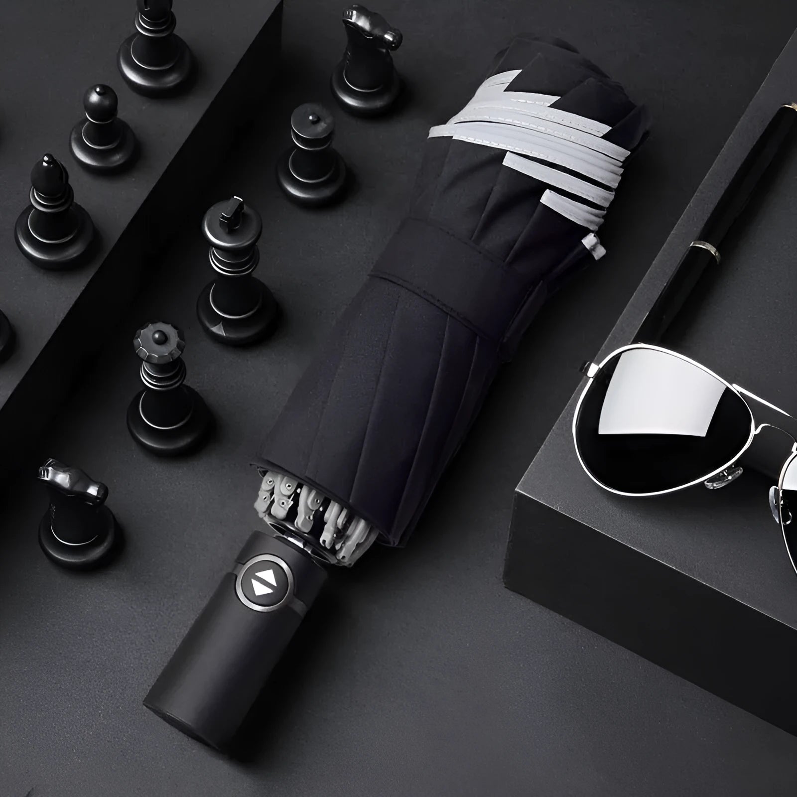Black automatic reverse umbrella with reflective fabric shown open with 10 ribs