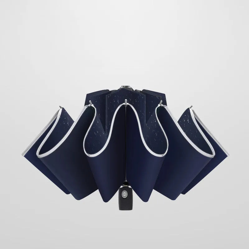 Black automatic reverse umbrella with reflective fabric shown open with 10 ribs
