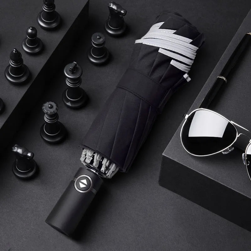 Black automatic reverse umbrella with reflective fabric shown open with 10 ribs