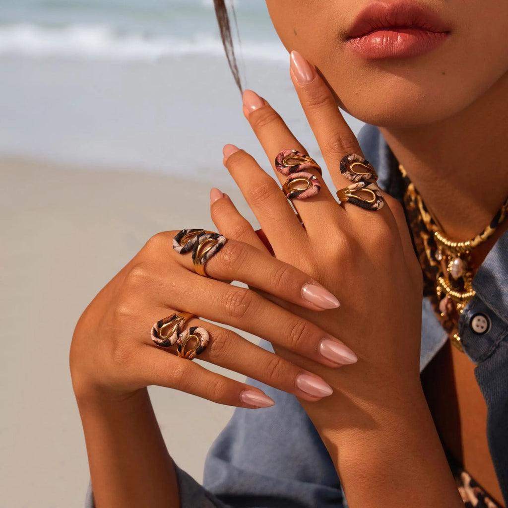 Women's adjustable stainless steel ring with geometry heart and star shapes featuring leopard print design