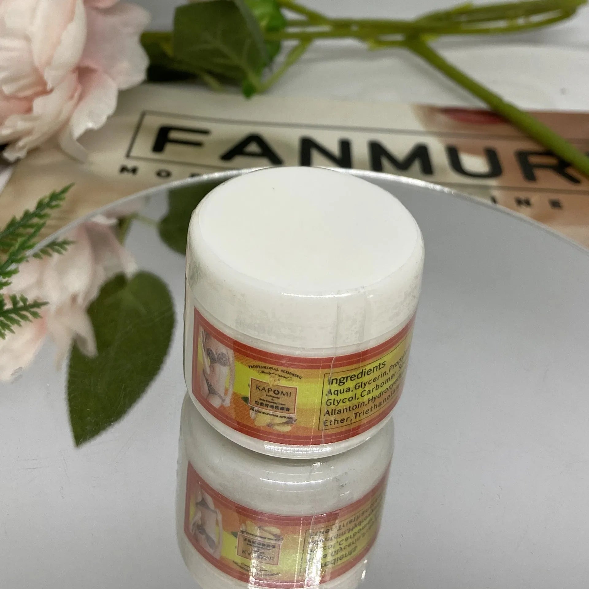 Ginger firming massage cream in a jar, 50g net content, photo colour
