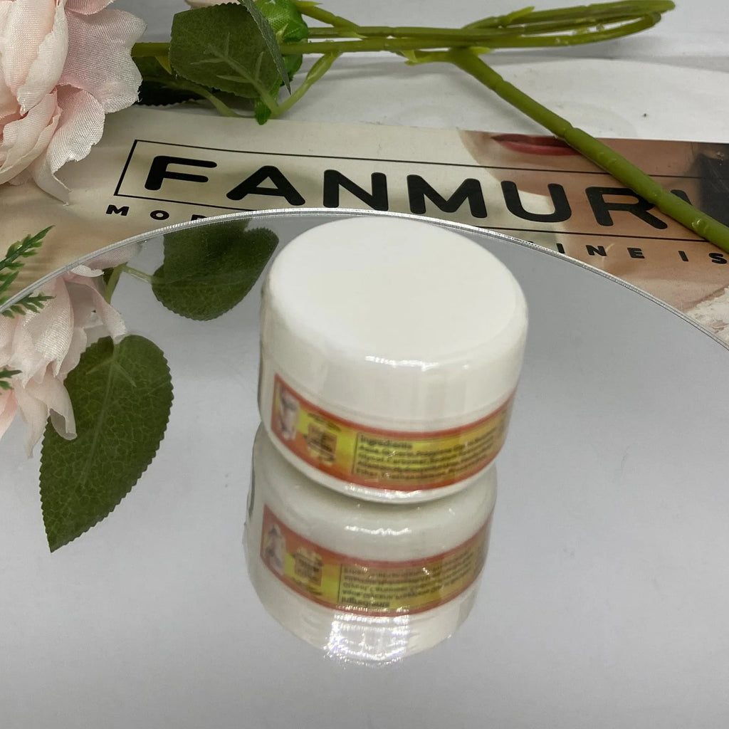 Ginger firming massage cream in a jar, 50g net content, photo colour