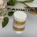 Ginger firming massage cream in a jar, 50g net content, photo colour