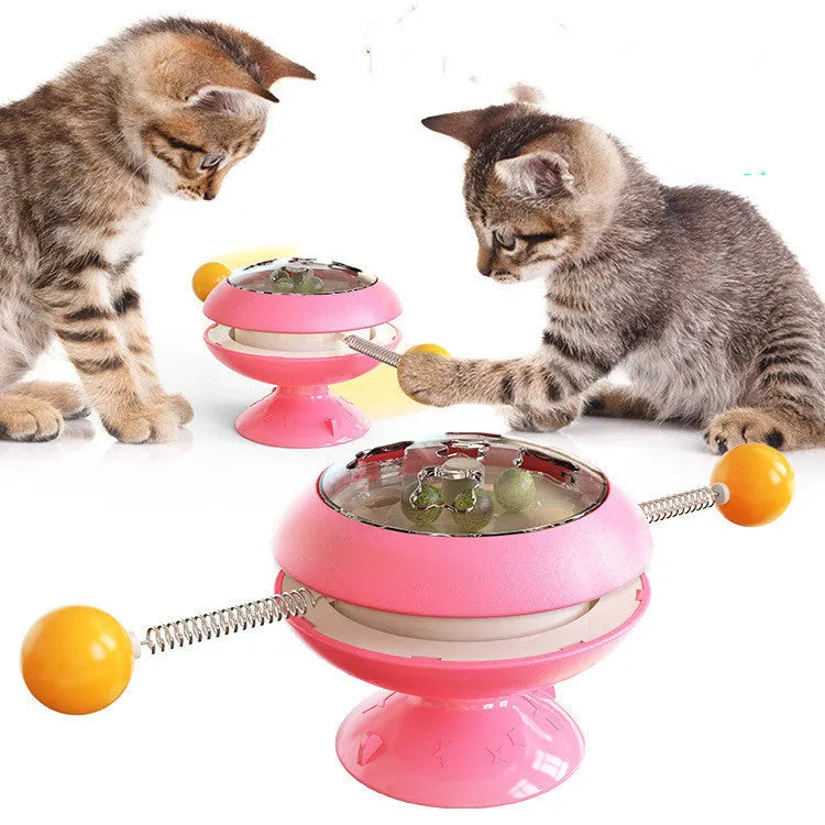 Rotatable interactive cat toy with catnip balls inside a transparent top and a large suction cup base, shown in lake blue.