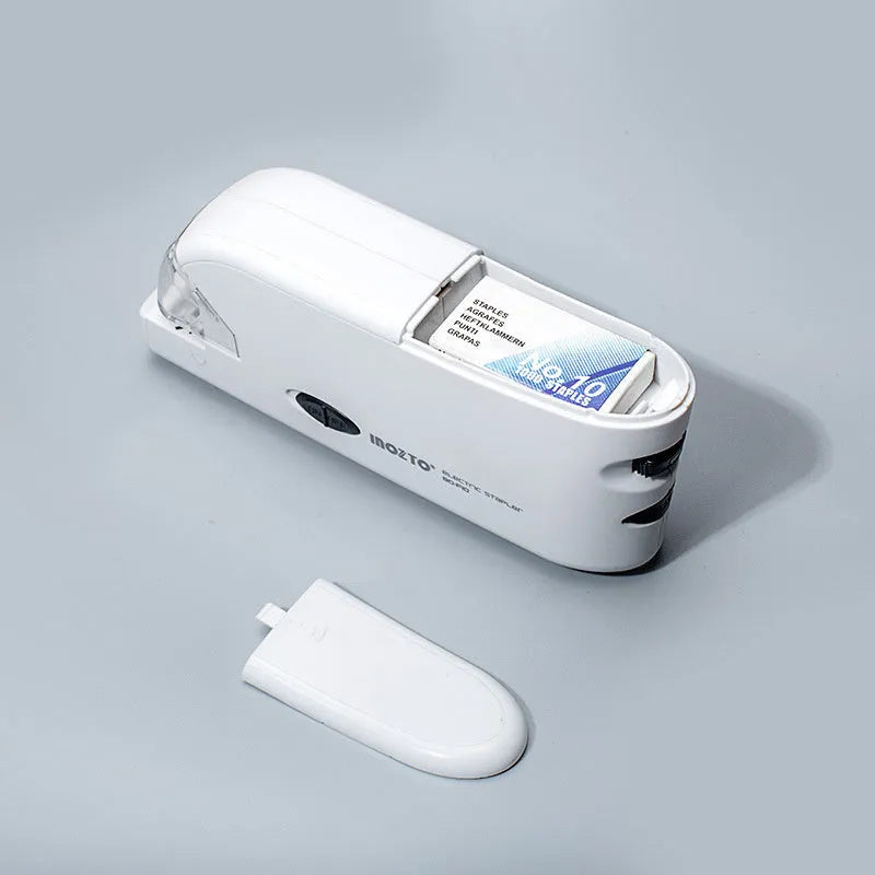 White electric flat stapler with automatic induction on desk, 184x45x84mm size