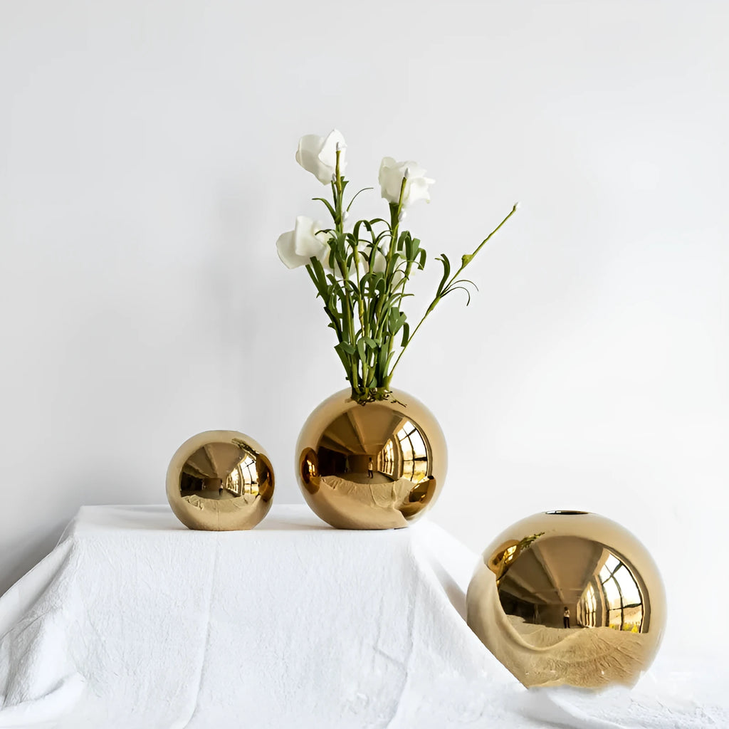 Handmade spherical electroplated ceramic gold vase on a tabletop, three sizes available for home decor