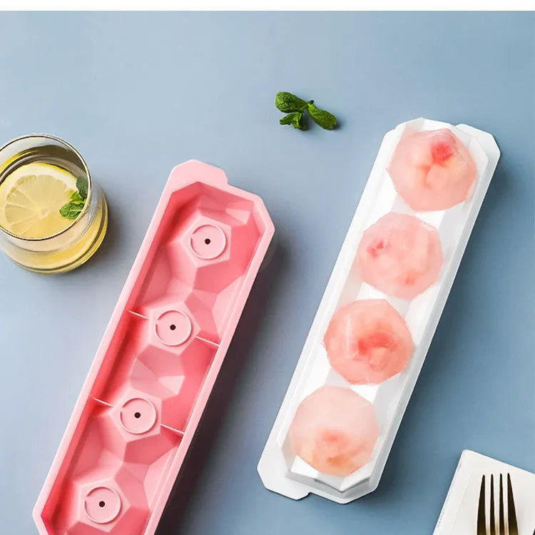 Flexible silicone ice tray for making large ice hockey shapes and spherical or pentagonal ice cubes in various colours